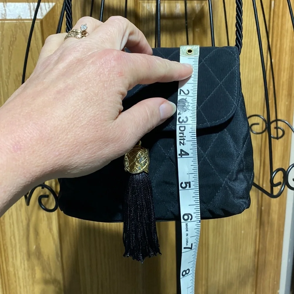 Neiman Marcus Gold Tassel Bag Small
Luxury purse​​ - Picture 9 of 11